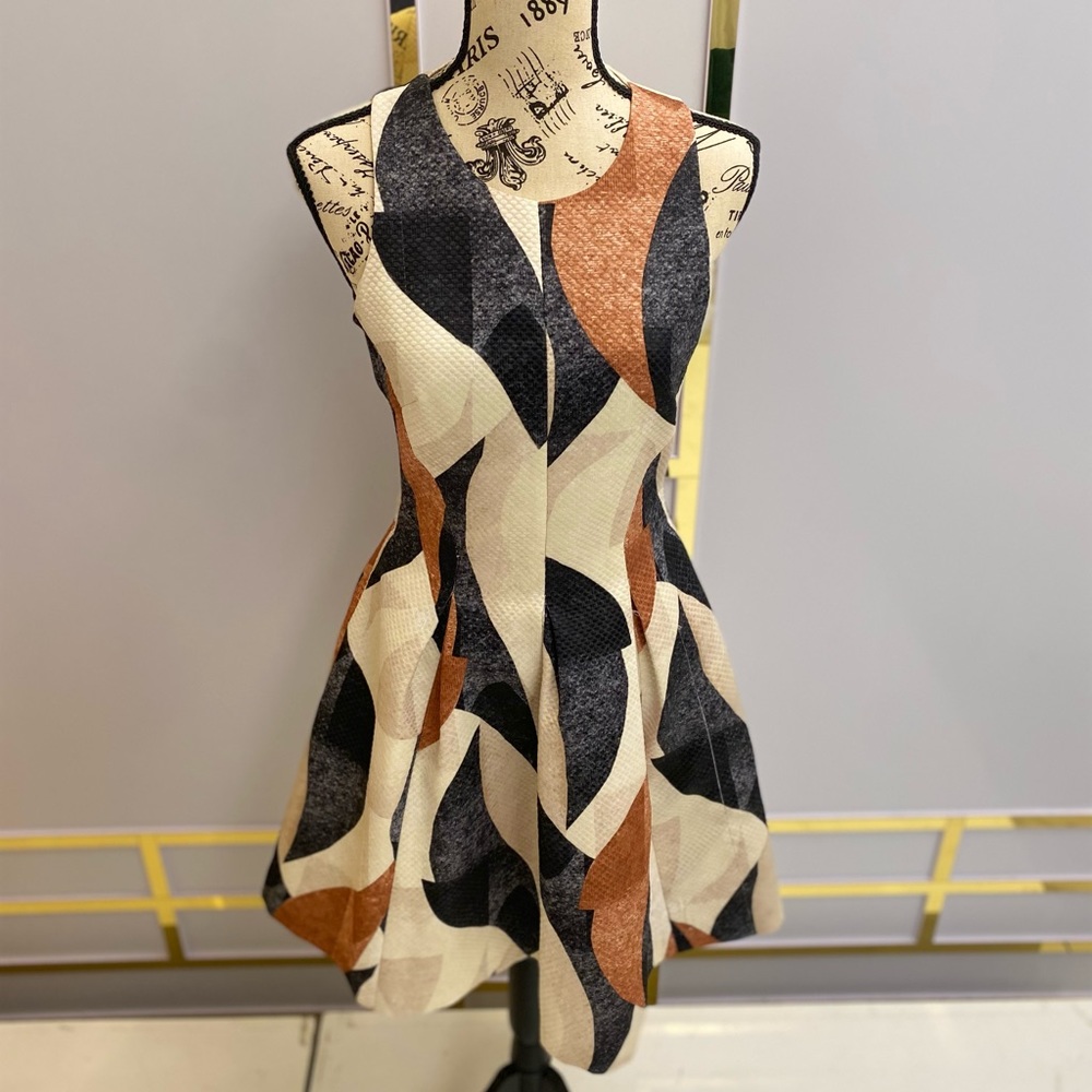 H&M: above the knee, size 6 sleeveless dress.